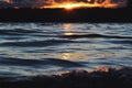 Waves at sunset on lake Piros