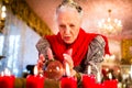 Soothsayer during esoteric session with Crystal ball Royalty Free Stock Photo