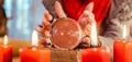 Soothsayer during a Seance with Crystal ball Royalty Free Stock Photo