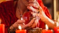 Soothsayer during a Seance or session with Crystal ball Royalty Free Stock Photo