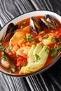 Sopa de Mariscos Seafood Soup closeup in the plate. Vertical Royalty Free Stock Photo