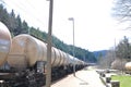 Sopac, Croatia April 2021. A freight train carries crude oil tanks. Oil cargo train on railway.