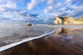 Sopelana beach with wave foam and reflections