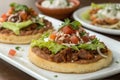Sopes: Thick Corn Tortillas Topped with Beans, Meat, and Fresh Salsa Royalty Free Stock Photo