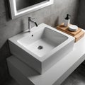 A sophisticated bathroom setup with a sleek basin and subtle decor. Royalty Free Stock Photo