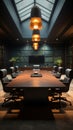 Sophisticated boardroom design large black table, plush brown chairs, TV