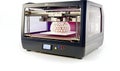 Advanced 3 d printer creating intricate object in a modern manufacturing setting Royalty Free Stock Photo
