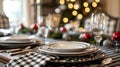 A sophisticated dining room with a mix of classic patterns including a black and white houndstooth tablecloth pinstriped