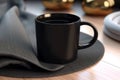 Sophisticated display, black coffee mug mockup with linen napkin Royalty Free Stock Photo