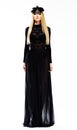 Sophisticated Elegant Blonde in Evening Black Dress and Headwear with Feathers. Art Design