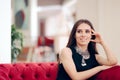 Beautiful Elegant Woman Waiting in Hotel Lobby Royalty Free Stock Photo