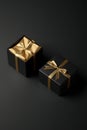 Two Black Gift Boxes Mockup with Golden Wrapping Paper, Opened and Closed On Black Background Royalty Free Stock Photo