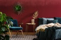 Sophisticated red bedroom with mirror