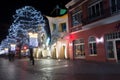 Crooked little house on Bohaterow Monte Cassino street at winter time at night