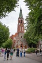 Saint George church in Sopot (Kosciol sw. Jerzego w Sopocie) with tourists visiting the city Royalty Free Stock Photo