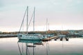 Sopot, Poland - October 13, 2022: Luxury yachts docked in sea port at sunset. Marine parking of modern motor boats and Royalty Free Stock Photo