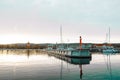 Sopot, Poland - October 13, 2022: Luxury yachts docked in sea port at sunset. Marine parking of modern motor boats and Royalty Free Stock Photo