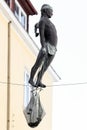 Sopot, Poland. Sculpture of the fisherman between living houses