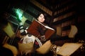 Sorceress with books.