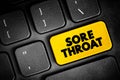 Sore Throat is pain, scratchiness or irritation of the throat that often worsens when you swallow, text button on keyboard, Royalty Free Stock Photo