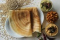 Sorghum Pancakes. Crispy pancakes made of whole grain Sorghum and lintels. Popularly known as Jowar dosa. Served with chickpea Royalty Free Stock Photo