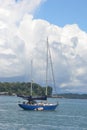 A beautiful little yacht is mooring at the sea. Raja Ampat tourism purpose