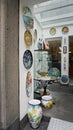 Sorrento, Italy - May 23, 2023: Traditional ceramic plates in souvenir shop in Sorrento at Italy