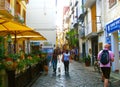 SORRENTO,ITALY - SEPTEMBER, 2012: Atmosphere of streets of Sorrento. Architecture of old colorful houses, cafes, souvenirs. shops