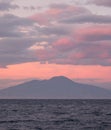 Sunset in the Bay of Naples, Italy. Mount Vesuvius can be seen on the horizon. Photographed near Sorrento . Royalty Free Stock Photo