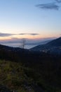 Photograph taken in Sorrento, Italy, showcasing a nighttime view of the entire city with the sunset