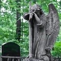 The Sorrowful Angel. Weeping angel with a cross, space for text