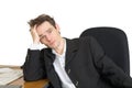 Sorrowful businessman on a workplace Royalty Free Stock Photo