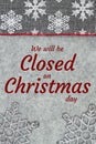 Closed Christmas Day sign with gray and white snowflakes