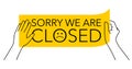 Sorry we are closed - hands pasting sticker with Royalty Free Stock Photo