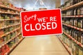 Sorry we are closed label on an abstract Supermarket background Royalty Free Stock Photo