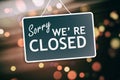 Sorry we are closed sign on abstract background Royalty Free Stock Photo