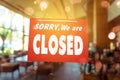 Sorry we are closed sign hang on door of business shop Royalty Free Stock Photo