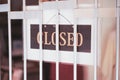 Sorry we are closed sign hang on door of business shop Royalty Free Stock Photo