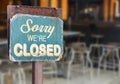 Sorry we are closed sign hanging outside a restaurant, store, office or other Royalty Free Stock Photo