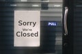 Sorry we are closed sign hanging outside a restaurant, store, office or other Royalty Free Stock Photo