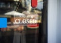 Sorry we are closed sign hanging outside a restaurant, store, office or other Royalty Free Stock Photo