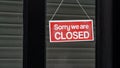 Sorry we are closed sign in a shop window Royalty Free Stock Photo