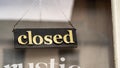 Sorry we are closed sign in a shop window Royalty Free Stock Photo