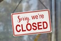 Sorry we are closed sign on the window of a shop. Economic crisis concept Royalty Free Stock Photo