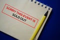 Sorry This Event Is Sold Out write on a book isolated on blue background Royalty Free Stock Photo