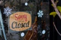 Sorry we\'re closed sign. grunge image hanging on a dirty glass door. Royalty Free Stock Photo