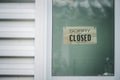 Sorry we`re closed sign. grunge image hanging on a door Royalty Free Stock Photo