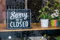Sorry we\'re closed sign. grunge image hanging on a metal door Royalty Free Stock Photo