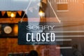 Sorry we\'re closed . vintage black and white retro sign on a coffee glass door Royalty Free Stock Photo