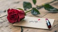 Sorry written on paper in front of red rose. Forgiveness concept Royalty Free Stock Photo